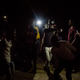 Young men dance to Ami's last song at her performance on May 20, 2017 in Macina, Mali.